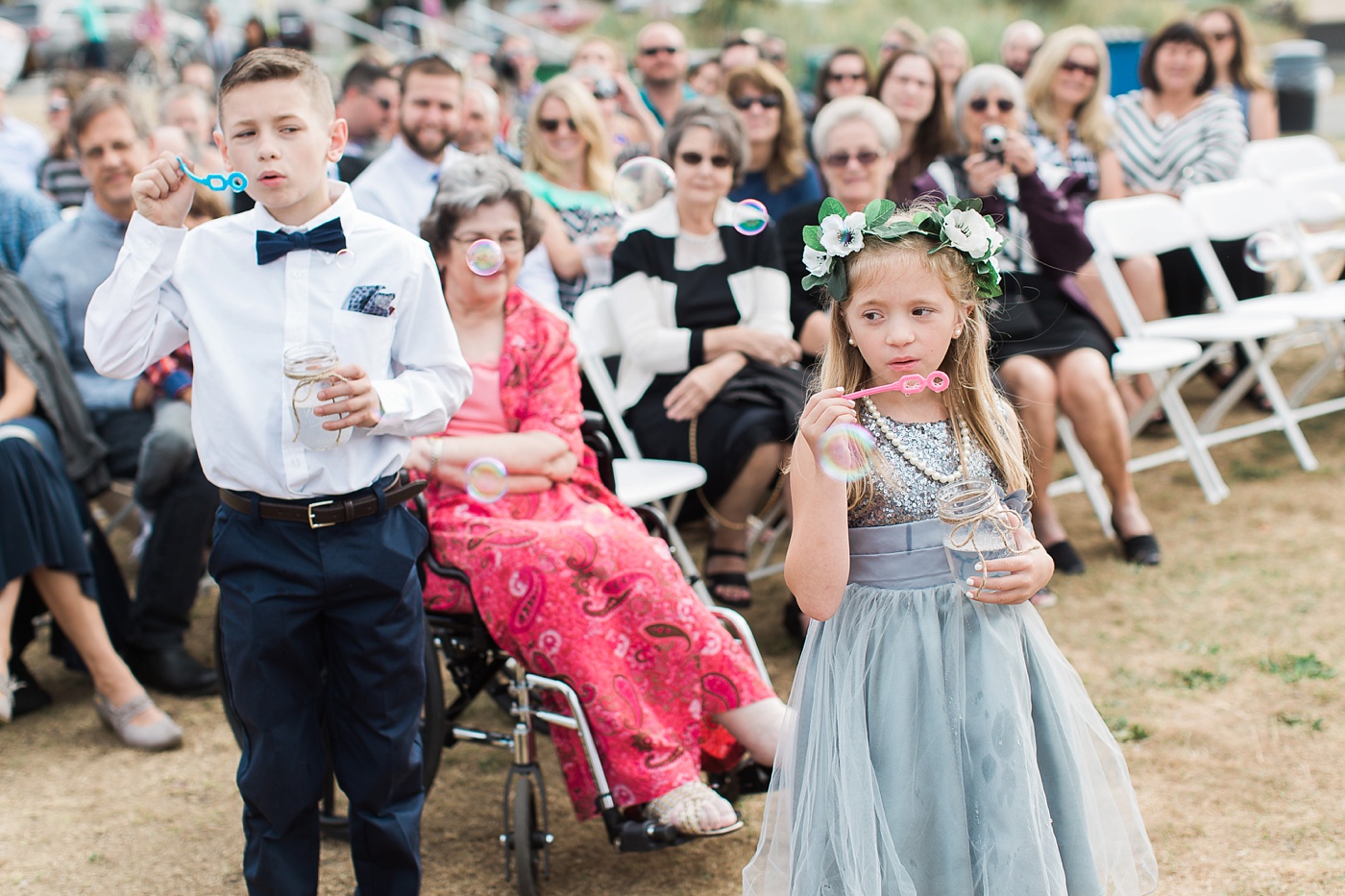 Bubble blowing ring bearer and flower girl